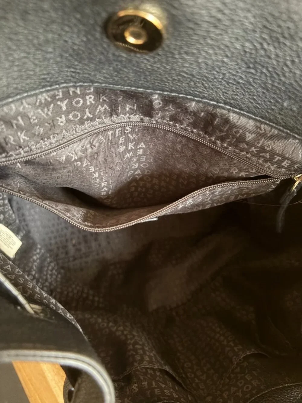 Kate Spade Pebbled Leather Backpack with tassles